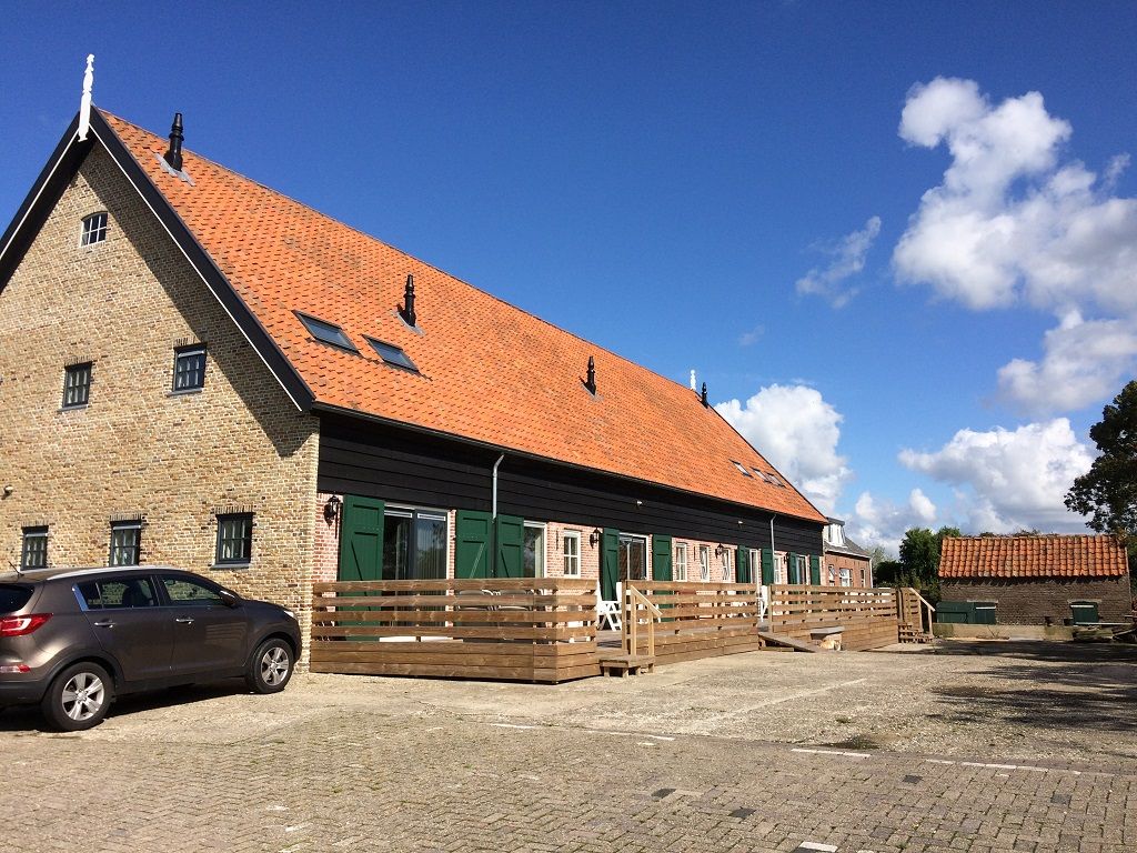 De gerestaureerde Zeeuwse schuur met de appartementen